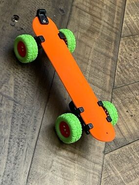 Pull-Back Skateboard Slap Bracelet, an innovative 2-in-1 novelty toy